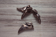 Bronze cast raven pendants by B.W. Williams Cutlery