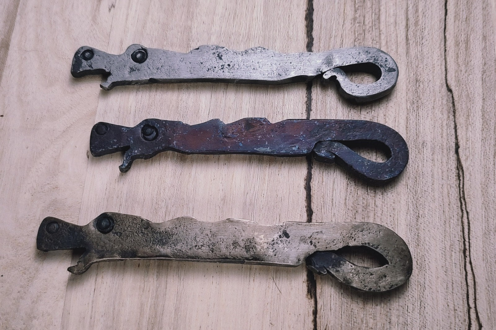 Sea serpent bottle openers by B.W. Williams Cutlery