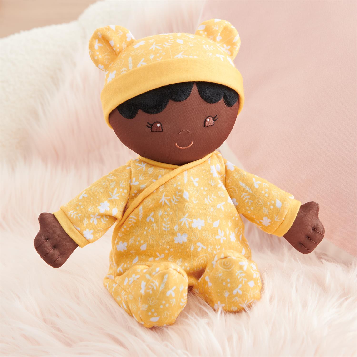 Plush Baby Doll Sustainable Camellia Dressed In A Yellow Onesie by Homeportonline