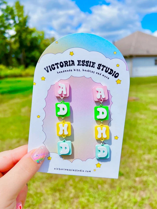 Earrings by Victoria Essie Studio