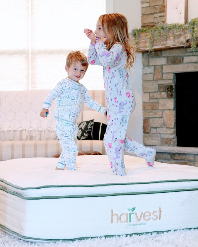 Kids playing on Harvest natural kids mattress