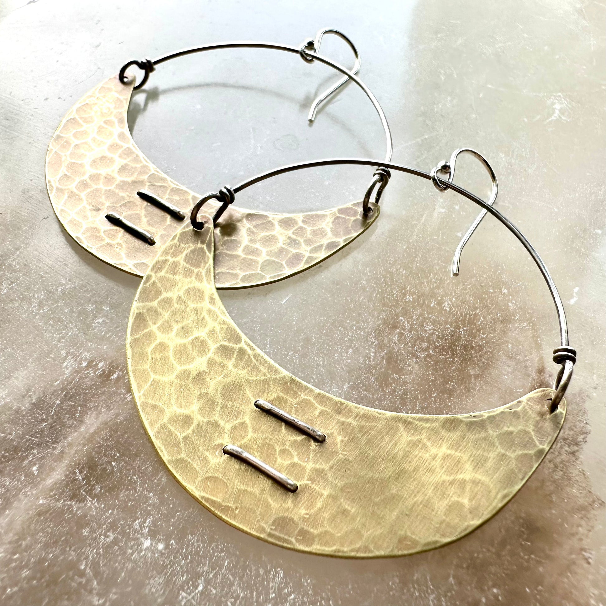 Stitched Brass Crescent Earrings by jenkahnjewelry