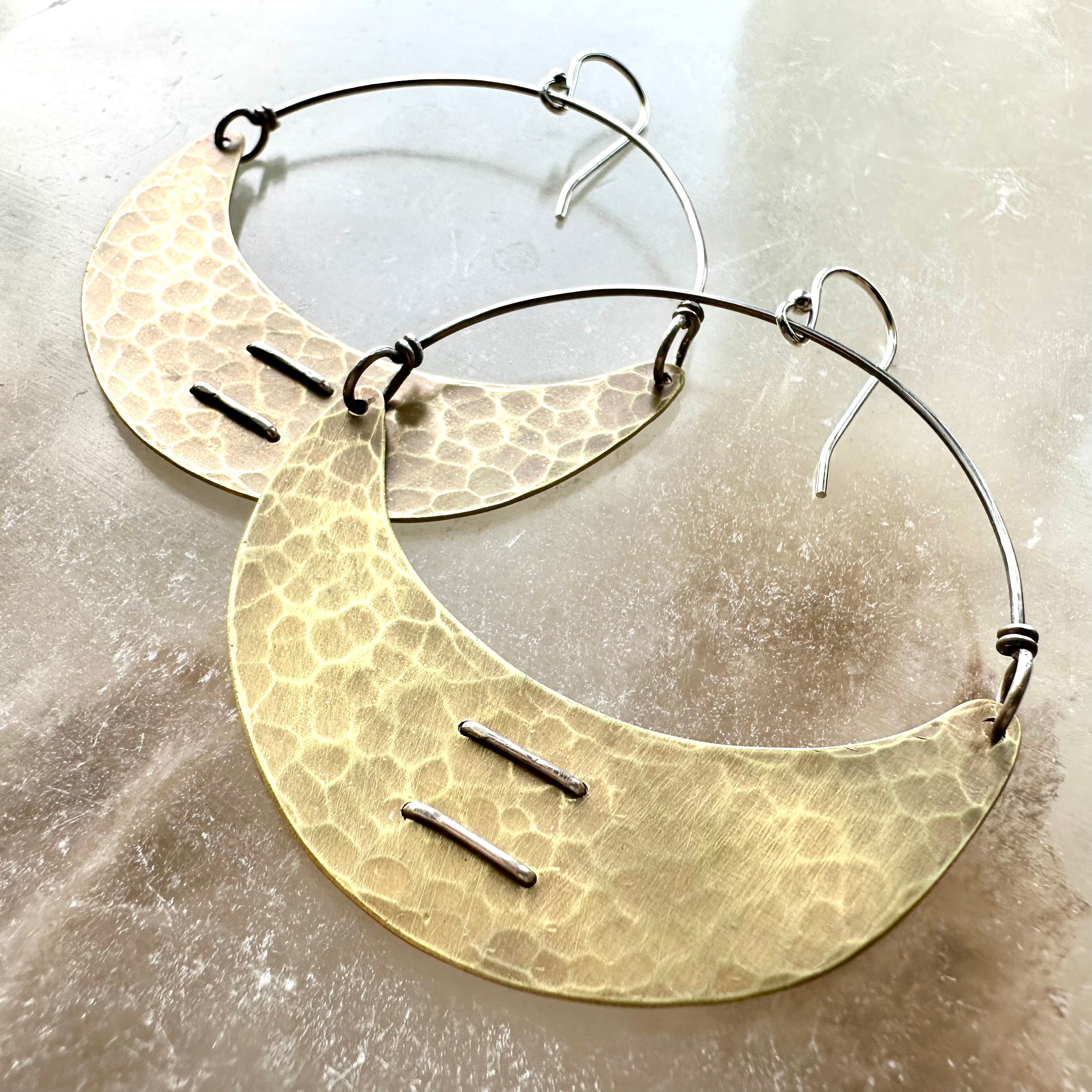 Stitched Brass Crescent Earrings by jenkahnjewelry