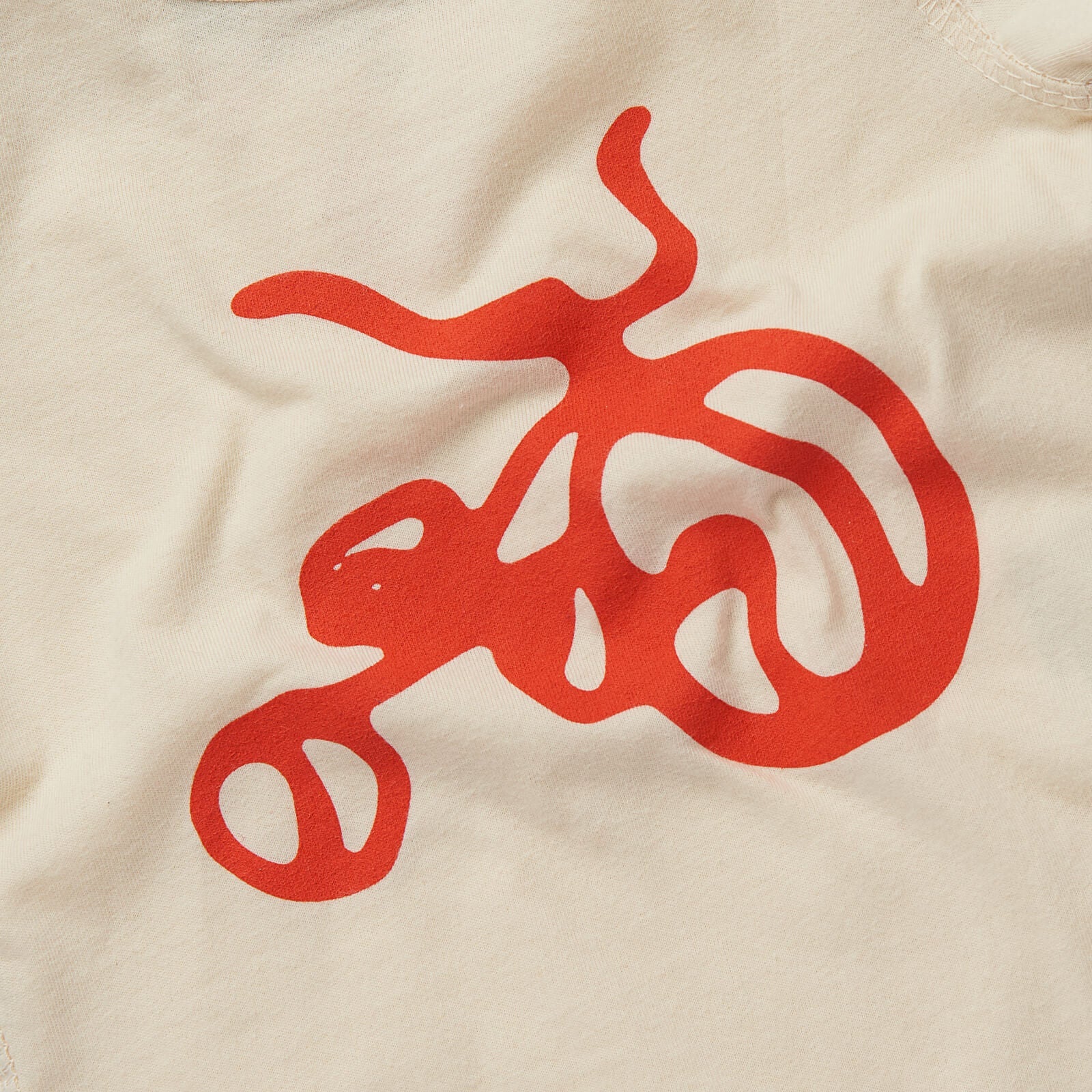 Tricycle Baby Onesie - Cream by Kaden Apparel