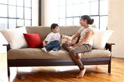Two children sitting on display WLH Green Cotton and Wool Dreamton 5" Futon