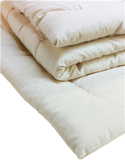 Stack of folded WLH Topper Organic Wool in white