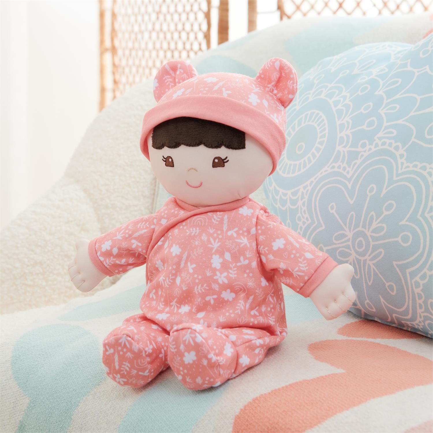 Plush Baby Doll Sustainable Hibiscus Dressed In A Peach Onesie by Homeportonline