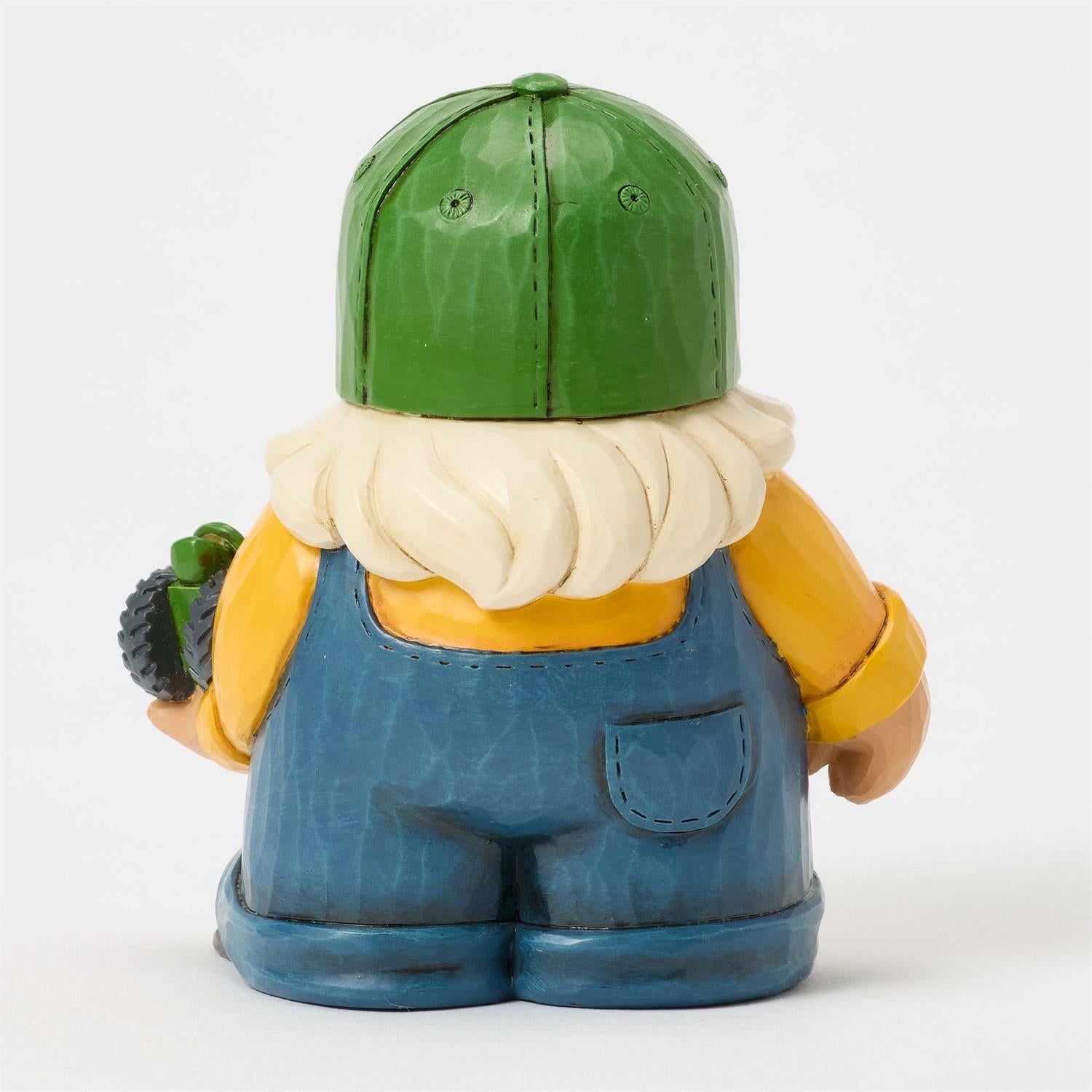 Farmer Gnome Holding Deere Tractor