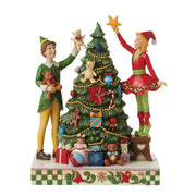 Buddy the Elf and Jovie Elf Decorating a tree