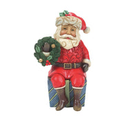 Santa Sitting on Gifts